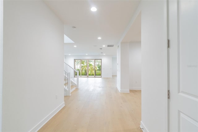 hall featuring light hardwood / wood-style flooring