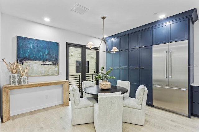 dining room featuring light hardwood / wood-style flooring