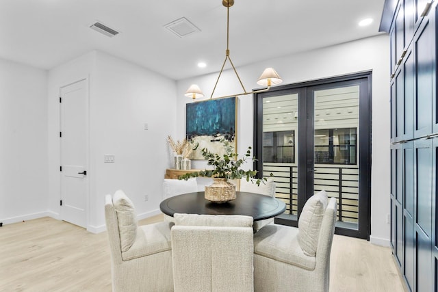 dining room featuring light wood-type flooring