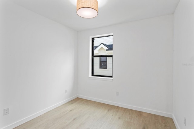 unfurnished room featuring light hardwood / wood-style flooring