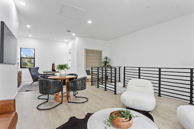 dining space featuring light hardwood / wood-style floors