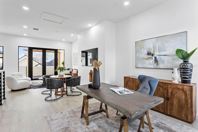 office space with light hardwood / wood-style floors