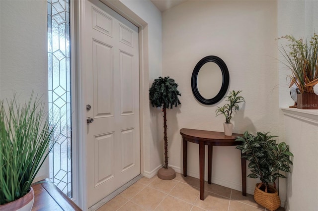 view of tiled foyer entrance