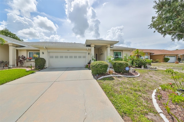 single story home featuring a garage