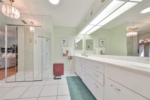 bathroom featuring tile patterned floors and vanity