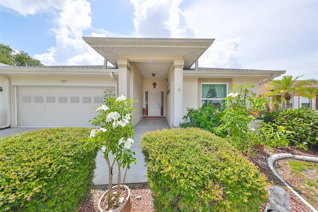 view of front of home with a garage