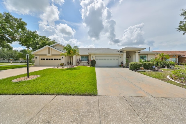 ranch-style home with a front yard and a garage