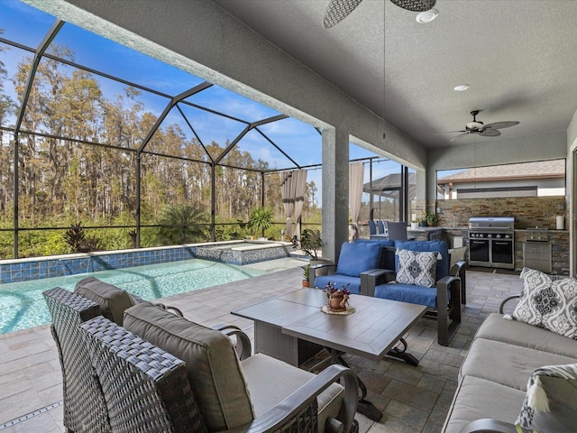 view of patio featuring outdoor lounge area, ceiling fan, a pool with hot tub, grilling area, and area for grilling