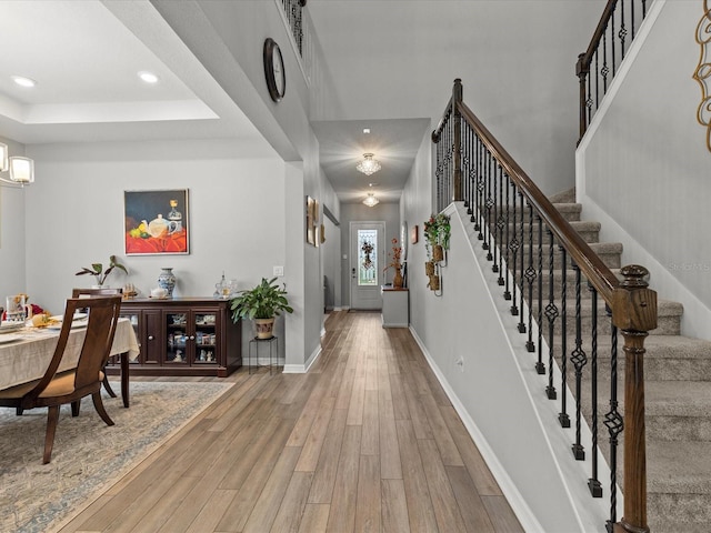 entrance foyer featuring hardwood / wood-style floors