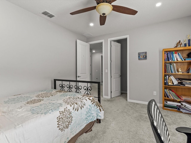 carpeted bedroom featuring ceiling fan