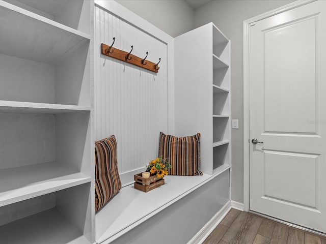 mudroom with wood-type flooring