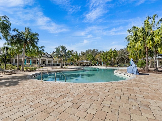 view of pool featuring a patio area