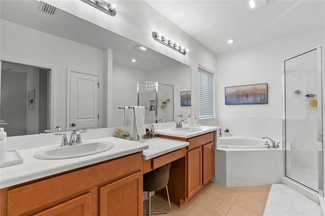 bathroom featuring tile patterned floors, vanity, and independent shower and bath