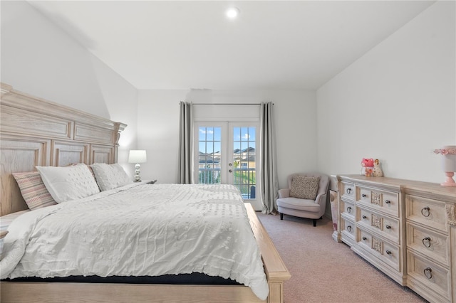 bedroom featuring access to outside and light carpet