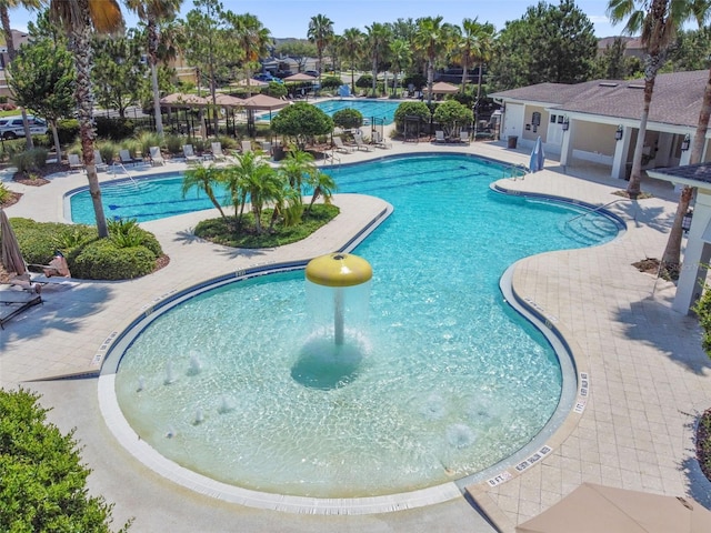 33975 Astoria Cir, Wesley Chapel, FL 33545 - community pool featuring a patio