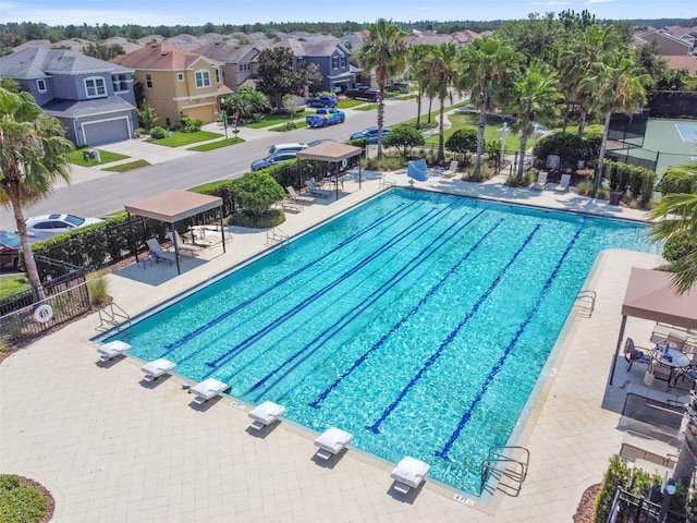 33975 Astoria Cir, Wesley Chapel, FL 33545 - community pool featuring a residential view, a gazebo, and a patio