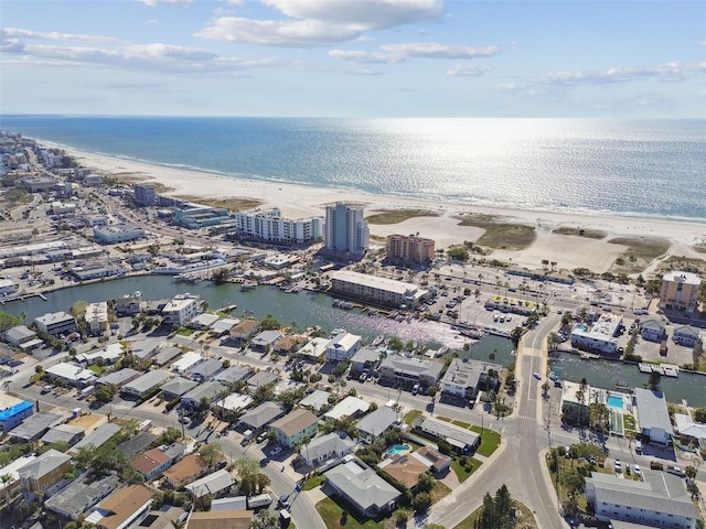 aerial view with a view of the beach and a water view