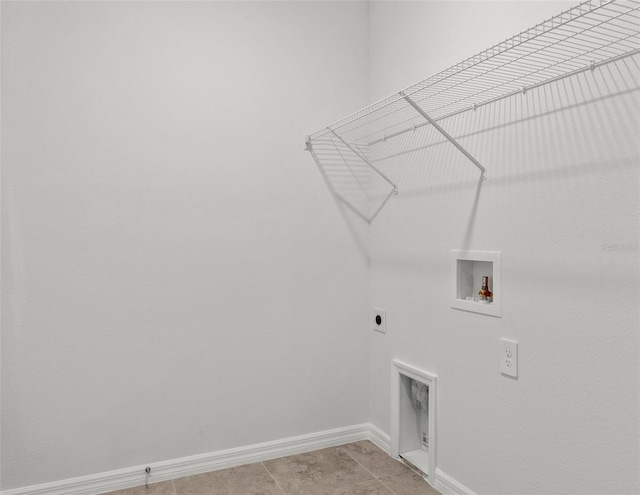 laundry room with light tile patterned flooring, washer hookup, and hookup for an electric dryer