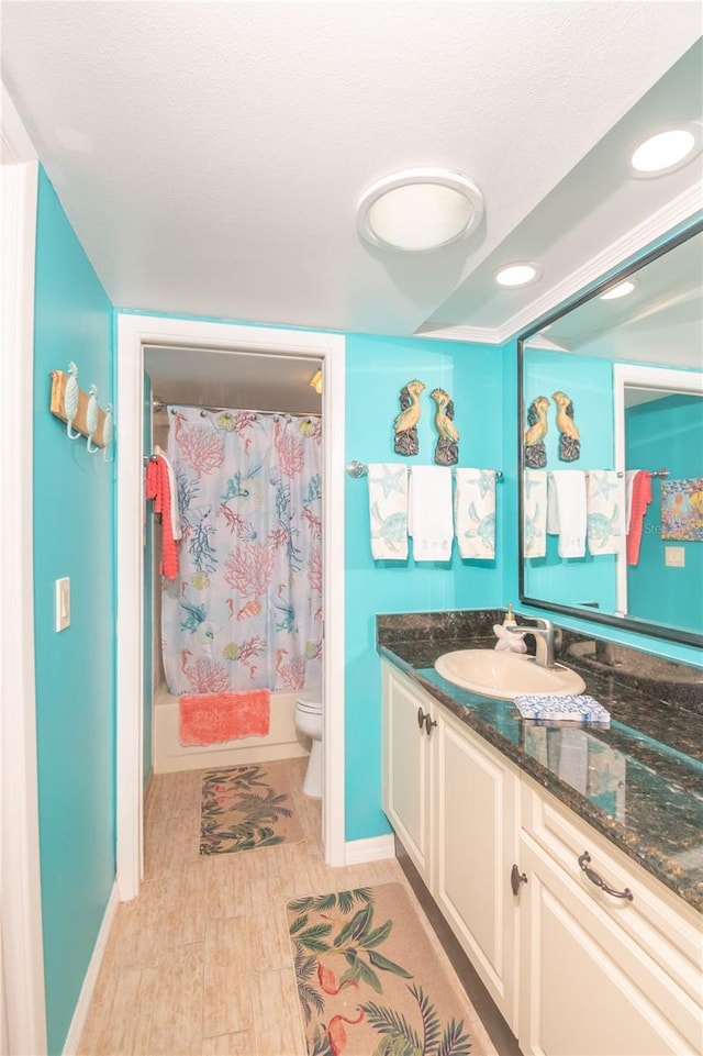 full bathroom featuring shower / bath combination with curtain, wood-type flooring, vanity, and toilet