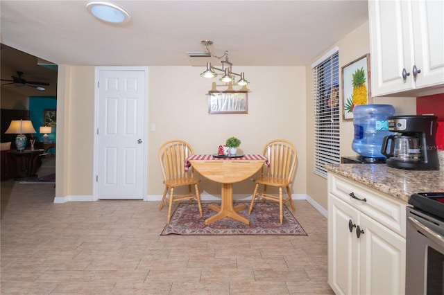 dining area with ceiling fan