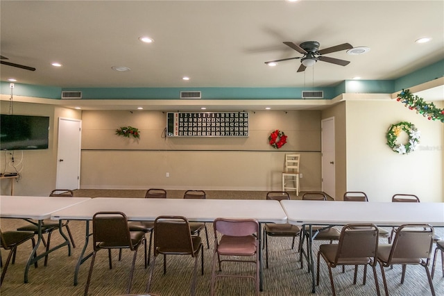 interior space featuring ceiling fan