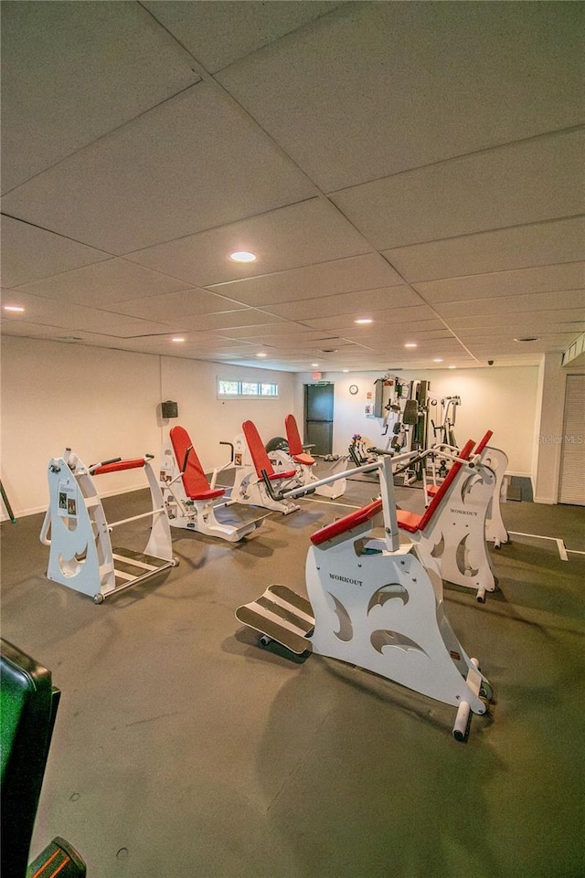 workout area featuring a paneled ceiling