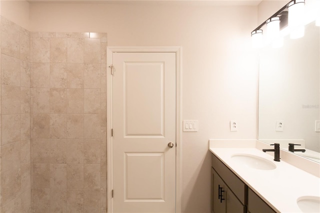 133 Angol St, Punta Gorda, FL 33983 - full bathroom featuring double vanity and a tile shower