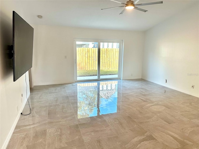 unfurnished room with ceiling fan