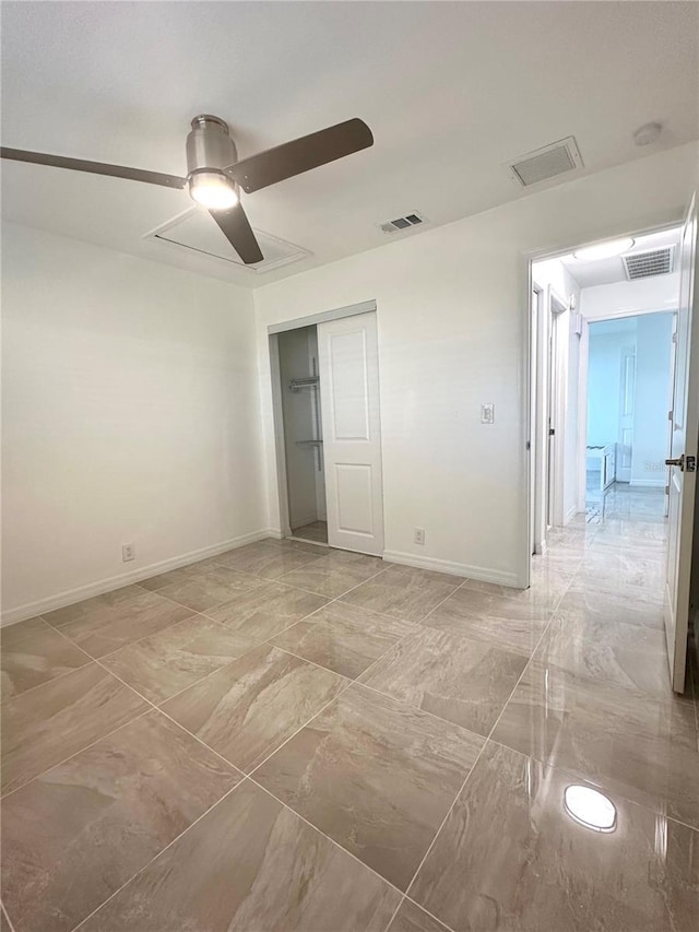 unfurnished room featuring ceiling fan