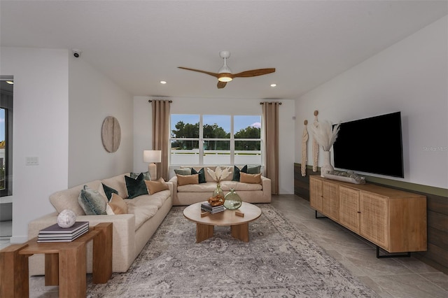 living room featuring ceiling fan