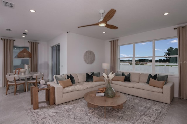 living room with ceiling fan