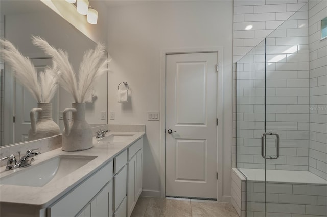 bathroom with vanity and an enclosed shower