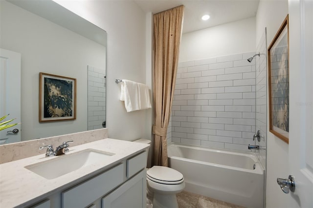 full bathroom with vanity, toilet, and shower / bath combo