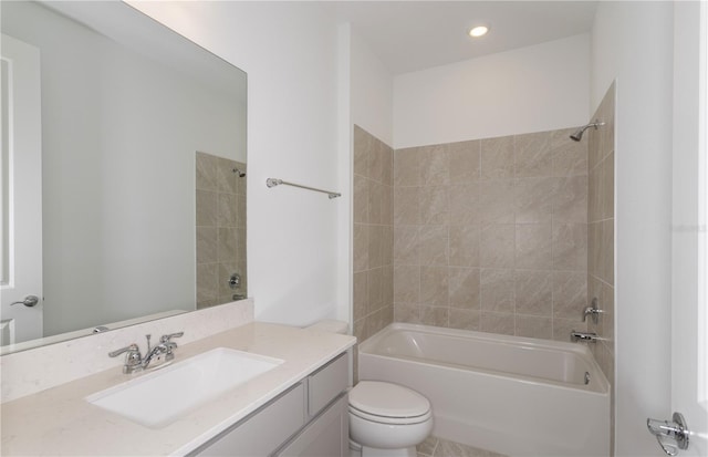 bathroom featuring toilet, recessed lighting, washtub / shower combination, and vanity