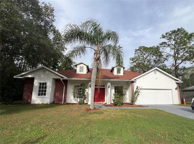 ranch-style home featuring a garage and a front lawn