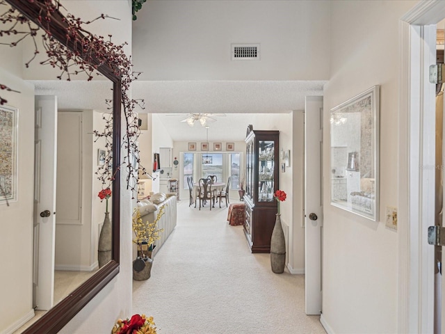2231 Utopian Dr E Unit 321, Clearwater, FL 33763 - hall featuring light carpet