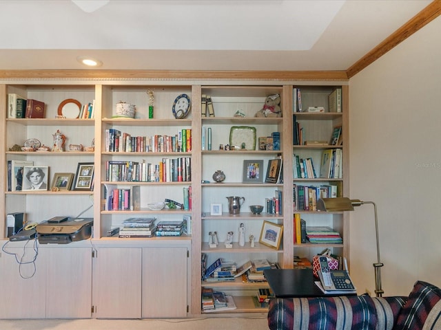 sitting room featuring ornamental molding