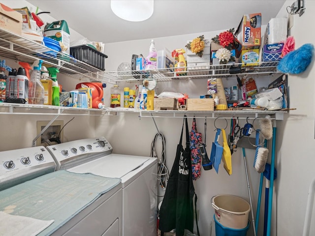 clothes washing area featuring washing machine and dryer