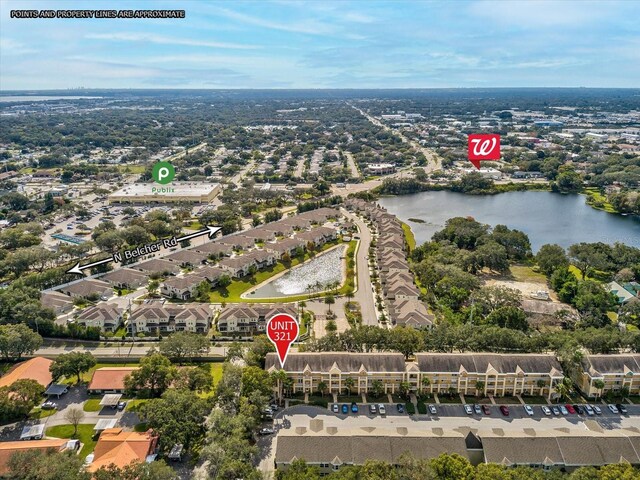 2231 Utopian Dr E Unit 321, Clearwater, FL 33763 - aerial overview of property's location with a large body of water and nearby suburban area