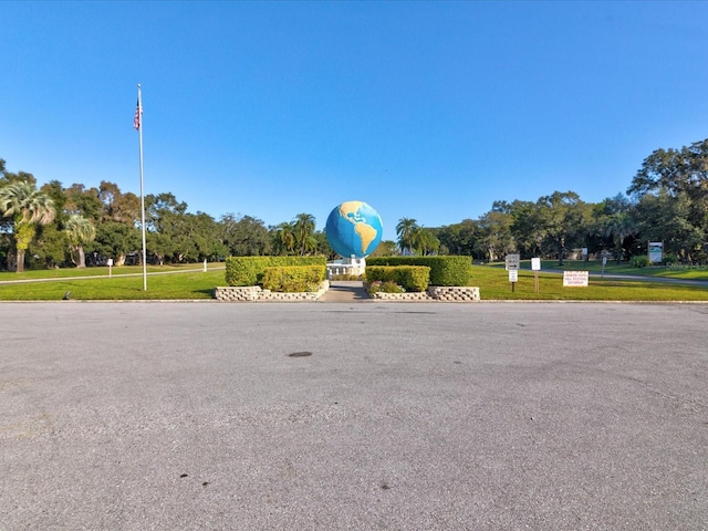 2231 Utopian Dr E Unit 321, Clearwater, FL 33763 - view of asphalt road with curbs