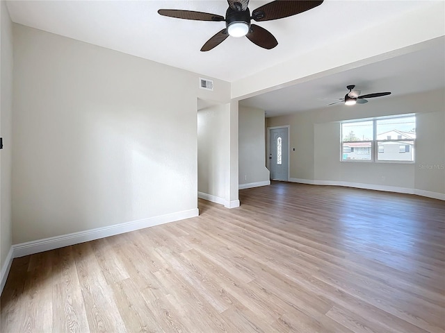 unfurnished room with ceiling fan and light hardwood / wood-style floors