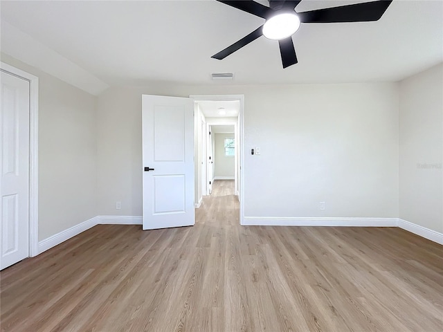 unfurnished bedroom featuring light hardwood / wood-style floors and ceiling fan