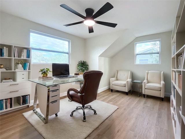 home office featuring ceiling fan and light hardwood / wood-style flooring