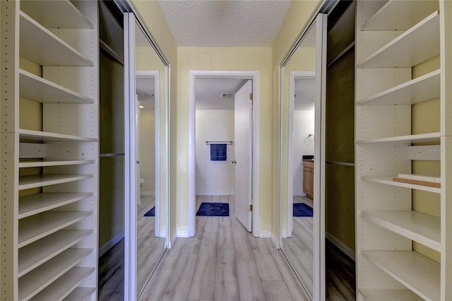 1430 Gulf Blvd Unit 204, Clearwater Beach, FL 33767 - hall featuring light wood-style floors and baseboards