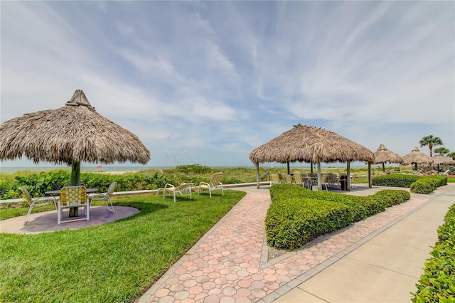 view of community featuring a gazebo and a yard