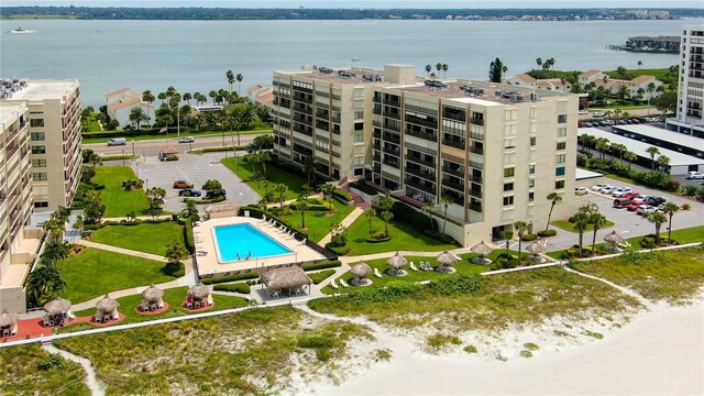 birds eye view of property with a water view