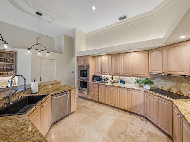 kitchen featuring sink, light brown cabinets, pendant lighting, decorative backsplash, and appliances with stainless steel finishes