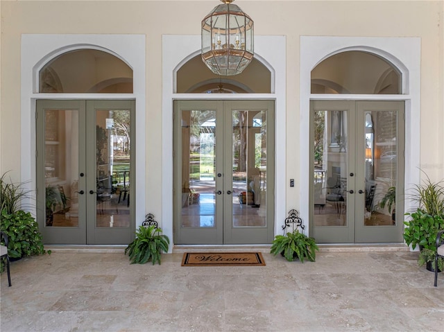 entrance to property featuring french doors