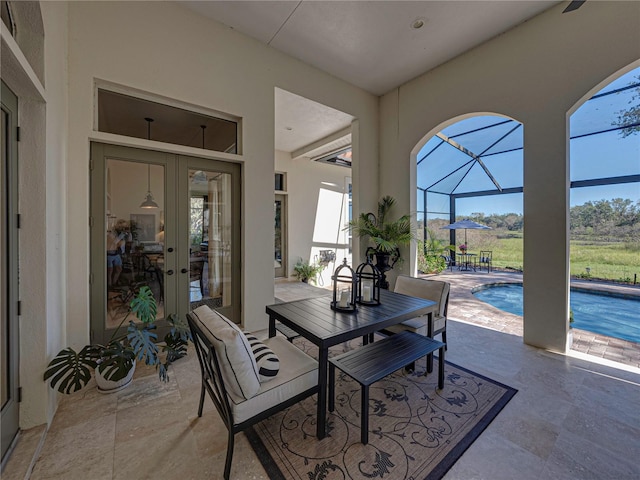 dining space featuring french doors