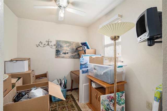 storage room with ceiling fan